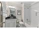 Bathroom featuring white subway tile in the shower and a contrasting dark countertop over the vanity at 2908 Mabry Ne Ln, Brookhaven, GA 30319