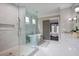 Bright bathroom featuring a walk in shower with glass door, a soaking tub, and double vanities at 2908 Mabry Ne Ln, Brookhaven, GA 30319