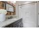Bathroom with vanity and framed mirror above granite counters plus shower and bathtub with subway tile at 2908 Mabry Ne Ln, Brookhaven, GA 30319