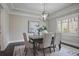 Elegant dining room with a stylish chandelier, a table set for four, and a serene ambiance at 2908 Mabry Ne Ln, Brookhaven, GA 30319