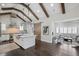 Bright, modern kitchen featuring wood beams, island, and stainless steel appliances at 2908 Mabry Ne Ln, Brookhaven, GA 30319