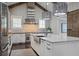Kitchen with a center island, stainless steel appliances, and a sliding barn door at 2908 Mabry Ne Ln, Brookhaven, GA 30319