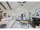 Well-lit living room with vaulted ceiling, clerestory windows, fireplace, and hardwood floors at 2908 Mabry Ne Ln, Brookhaven, GA 30319