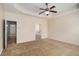 Spacious main bedroom features tray ceiling and an en suite bath at 3634 Cape Ln, Conyers, GA 30013