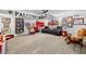 Finished basement with diverse sports memorabilia and comfortable seating arrangement at 450 Bay Grove Se Rd, Loganville, GA 30052