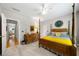 Nicely decorated bedroom with four-poster bed and lots of natural light at 450 Bay Grove Se Rd, Loganville, GA 30052