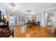 Elegant dining room with hardwood floors, decorative lighting, and beautiful interior design at 450 Bay Grove Se Rd, Loganville, GA 30052