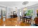 Formal dining room featuring hardwood floors and chandelier at 450 Bay Grove Se Rd, Loganville, GA 30052