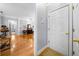 Inviting entryway showcases hardwood floors and access to various rooms at 450 Bay Grove Se Rd, Loganville, GA 30052