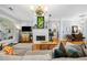 Spacious living room features a fireplace, hardwood floors, and neutral decor for a warm and inviting gathering space at 450 Bay Grove Se Rd, Loganville, GA 30052