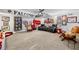Spacious living room showcasing sports memorabilia, a ceiling fan and comfortable seating at 450 Bay Grove Se Rd, Loganville, GA 30052