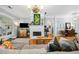 Open living room with fireplace, and hardwood floors at 450 Bay Grove Se Rd, Loganville, GA 30052