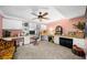 Bright home office features custom built-ins and a stylish tiger-print chair at 450 Bay Grove Se Rd, Loganville, GA 30052