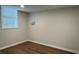 Finished basement featuring vinyl flooring and a bright window at 50 Stonington Pl, Marietta, GA 30068