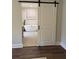 Elegant bathroom with freestanding tub and sliding barn door for a modern farmhouse touch at 50 Stonington Pl, Marietta, GA 30068