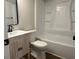 Updated bathroom with modern fixtures, vanity and bathtub with shower, offering a fresh and clean design at 50 Stonington Pl, Marietta, GA 30068