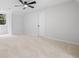Spacious bedroom with carpeted floor and a modern ceiling fan at 50 Stonington Pl, Marietta, GA 30068