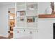 Elegant built-in shelving offering ample storage and displaying decorative items in the living room at 50 Stonington Pl, Marietta, GA 30068