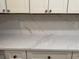 Kitchen features white countertops with subtle veining and modern hardware at 50 Stonington Pl, Marietta, GA 30068