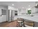 Bright, modern kitchen with stainless appliances, island with seating at 50 Stonington Pl, Marietta, GA 30068