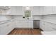 Bright white kitchen with stainless steel appliances, plenty of cabinet space, and modern fixtures at 50 Stonington Pl, Marietta, GA 30068