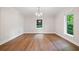 Open-concept room with hardwood floors, recessed lighting, and natural light at 50 Stonington Pl, Marietta, GA 30068