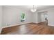 Bright living area with hardwood floors and contemporary lighting at 50 Stonington Pl, Marietta, GA 30068