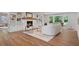 Bright living room with fireplace, built-in shelving, and large windows that offer ample natural light at 50 Stonington Pl, Marietta, GA 30068