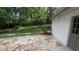 Flagstone patio adjacent to house with lush, wooded view at 50 Stonington Pl, Marietta, GA 30068