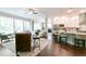 Open-concept living area connecting the living room and kitchen, perfect for entertaining guests at 719 Elizabeth Trl, Woodstock, GA 30189