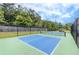 Enjoy recreational play with the community's two well-maintained, fenced, outdoor pickleball courts at 719 Elizabeth Trl, Woodstock, GA 30189