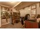 Basement office with white board, desk, work chair and monitor at 1365 Juniper Springs Trl, Loganville, GA 30052