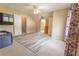 Spacious bedroom with carpet flooring, ceiling fan, and natural light at 1365 Juniper Springs Trl, Loganville, GA 30052