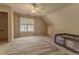 Comfortable bedroom features carpet flooring, ceiling fan, natural light, and closet at 1365 Juniper Springs Trl, Loganville, GA 30052