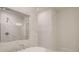 Bathroom featuring marble tiling, soaking tub, and shower at 145 Bre Dr, Fayetteville, GA 30215