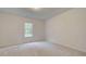 Neutral bedroom with carpet, a window and natural light at 145 Bre Dr, Fayetteville, GA 30215
