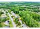 Charming single-Gathering home nestled within a mature tree-lined neighborhood offering a serene and private setting at 2285 Ashton Ridge Dr, Dacula, GA 30019
