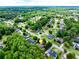 Traditional-style home nestled in a lush green neighborhood with mature trees and well-maintained lawns at 2285 Ashton Ridge Dr, Dacula, GA 30019