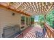 Cozy back porch with pergola and seating, perfect for enjoying the outdoors at 2285 Ashton Ridge Dr, Dacula, GA 30019