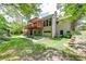 Exterior with a deck, and lush green backyard perfect for outdoor living at 2285 Ashton Ridge Dr, Dacula, GA 30019