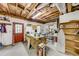 Unfinished basement area with workbench and access to the outdoors at 2285 Ashton Ridge Dr, Dacula, GA 30019