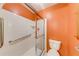 Contemporary bathroom featuring a glass-enclosed shower, toilet, and grab bars at 2285 Ashton Ridge Dr, Dacula, GA 30019