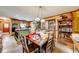 Open dining area with hardwood floors, seamlessly connecting to the kitchen at 2285 Ashton Ridge Dr, Dacula, GA 30019