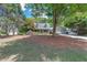 Inviting two-story home with mature trees and a spacious front yard at 2285 Ashton Ridge Dr, Dacula, GA 30019