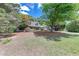 Beautiful home with manicured lawn, mature trees, and an inviting facade at 2285 Ashton Ridge Dr, Dacula, GA 30019