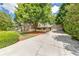 Lovely home featuring a long driveway and lush greenery, providing ample curb appeal at 2285 Ashton Ridge Dr, Dacula, GA 30019