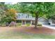Charming two-story home with well-maintained landscaping and a welcoming front porch at 2285 Ashton Ridge Dr, Dacula, GA 30019
