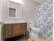 Bathroom featuring a wooden vanity with ample drawer space and tiled flooring at 445 Royal St, Mcdonough, GA 30253