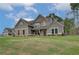 Charming two-story home with brick accents, well-manicured lawn, and inviting curb appeal on a beautiful lot at 72 Homesite Cooper W Cv, Fayetteville, GA 30215