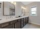 Elegant bathroom featuring double sinks, quartz countertops, and modern fixtures at 830 Stone Ridge Ln, Atlanta, GA 30324